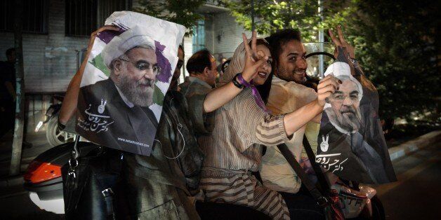 TEHRAN, IRAN- MAY 20: Supporters of President Hassan Rouhani celebrate after the results of the Iran vote were announced, in Tehran, Iran on May 20, 2017.  (Photo by Fatemeh Bahrami/Anadolu Agency/Getty Images)