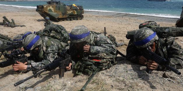 POHANG, SOUTH KOREA - APRIL 02:  South Korean marines participate in landing operation referred to as Foal Eagle joint military exercise with US troops Pohang seashore on April 2, 2017 in Pohang, South Korea. South Korea military troops held for joint annual military exercise with the U.S. drawing criticism from North Korea, arguing that these training exercises will worsen the standoff over North Korea's nuclear weapons program.  (Photo by Chung Sung-Jun/Getty Images)