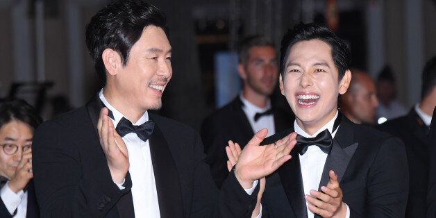 CANNES, FRANCE - MAY 24:  (L-R) Actors Kyoung-gu  Sul and Yim Si-wan attend the 'The Merciless (Bulhandang)' screening during the 70th annual Cannes Film Festival at Palais des Festivals on May 24, 2017 in Cannes, France.  (Photo by Dominique Charriau/WireImage)