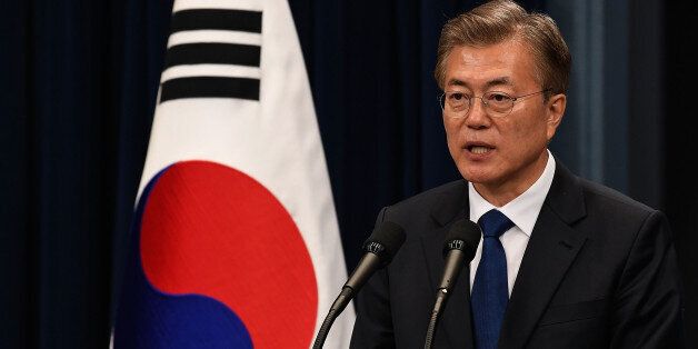 SEOUL, SOUTH KOREA - MAY 10:  South Korea's new President Moon Jae-In speaks during a press conference at the presidential Blue House on May 10, 2017 in Seoul, South Korea. Moon Jae-in of Democratic Party, was elected as the new president of South Korea in the election held on May 9, 2017.  (Photo by Kim Min-Hee-Pool/Getty Images)