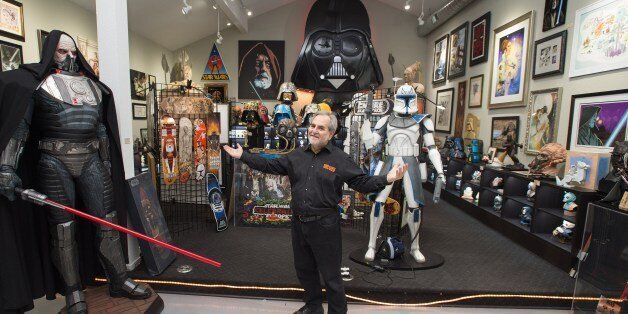 TO GO WITH AFP STORY BY JOCELYN ZABLIT 'ENTERTAINMENT-US-FILM-STARWARS-FANS'Steve Sansweet, owner and self-proclaimed CEO of Rancho Obi-Wan, the world's largest private collection of Star Wars memorabilia, poses for a photo inside one of the display rooms in Petaluma, California on November 24, 2015. The collection includes over 350,000 Star Wars items and is located at Sansweet's home. From the United States, to Russia, China and Saudi Arabia, the franchise has spawned a remarkable global fan b