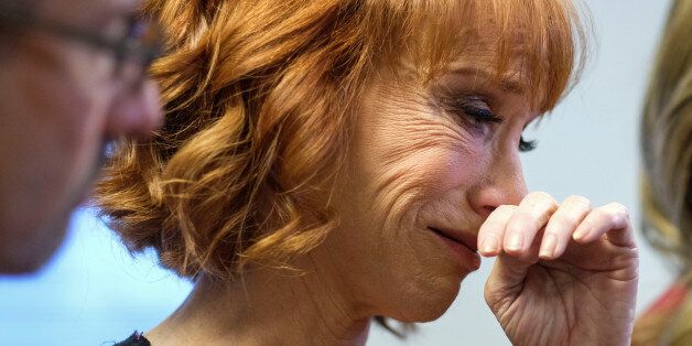 Comedian Kathy Griffin (C) cries during a news conference in Woodland Hills, Los Angeles, California, U.S., June 2, 2017. REUTERS/Ringo Chiu     TPX IMAGES OF THE DAY