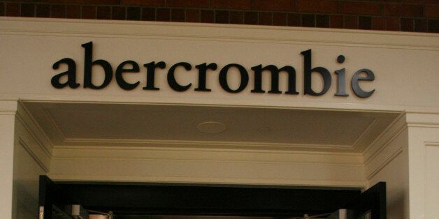A boy stands at the entrance of an Abercrombie & Fitch store at the Glendale Galleria mall in this November 28, 2008 file photo. Abercrombie & Fitch Co said on February 15, 2012, it expects its gross margins to recover