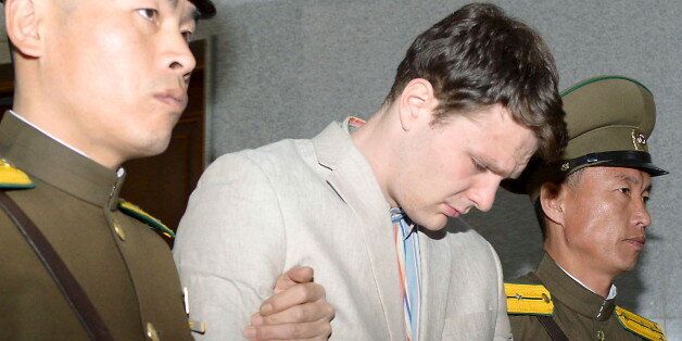 Otto Frederick Warmbier (C), a University of Virginia student who was detained in North Korea since early January, is taken out of North Korea's top court after being sentenced, in Pyongyang, North Korea, in this photo released by Kyodo March 16, 2016. North Korea's supreme court sentenced American student Warmbier, who was arrested while visiting the country, to 15 years of hard labour for crimes against the state, China's Xinhua news agency reported on Wednesday. Mandatory credit    REUTERS/Ky