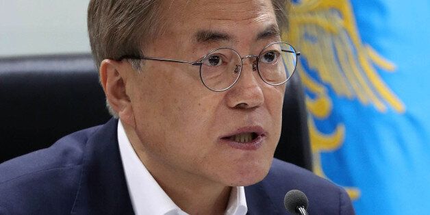 SEOUL, SOUTH KOREA - JUNE 08:  In this handout photo released by the South Korean Presidential Blue House, South Korean President Moon Jae-in speaks as he presides over a meeting of the National Security Council at the presidential Blue House on June 8, 2017 in Seoul, South Korea. According to the South Korean military, North Korea launched several cruise missiles from the east coast toward the ocean on June 8, 2017 in its fourth missile test in four weeks. The launch came amid the international