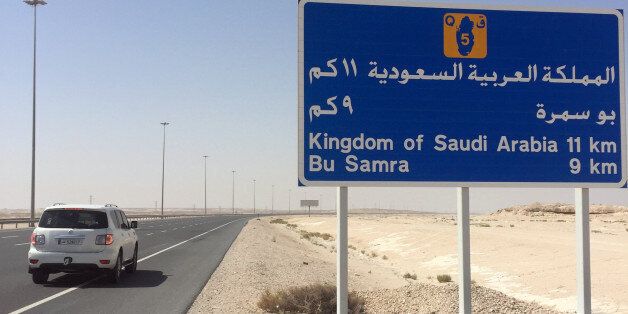 A road sign is seen near Abu Samra border crossing to Saudi Arabia, Qatar June 12, 2017. REUTERS/Tom Finn