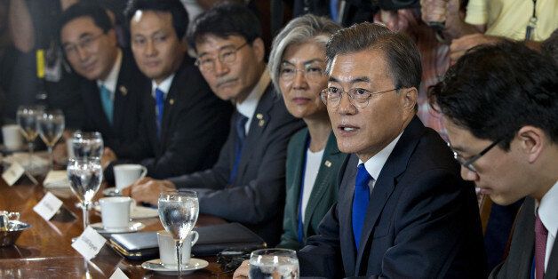 Moon Jae-in, South Korea's president, second right, speaks while meeting with House Republican and Democratic leadership in the speakers conference room at the U.S. Capitol in Washington, D.C., U.S., on Thursday, June 29, 2017. In a speech to business leaders in Washington on Wednesday evening, Moon said the alliance between the nations would only become stronger and stressed the need to resolve the North Korea nuclear issue. Photographer: Andrew Harrer/Bloomberg via Getty Images