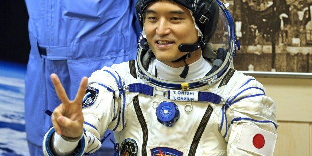KAZAKHSTAN - JULY 7, 2016: Japanese austronaut Takuya Onishi (JAXA), a member of the main crew of ISS Expedition 48/49, in a space suit ahead of the launch of a Soyuz FG rocket carrying the Soyuz MS-01 spacecraft to the International Space Station. Marina Lystseva/TASS (Photo by Marina LystsevaTASS via Getty Images)