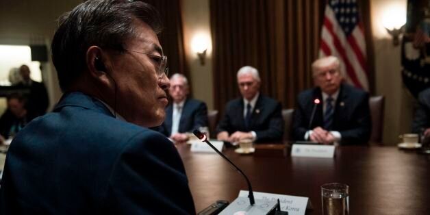 From left South Korea's President Moon Jae-in, US Secretary of Defense James Mattis, US Vice President Mike Pence and US President Donald Trump listen to opening comments before a meeting in the Cabinet Room of the White House June 30, 2017 in Washington, DC. / AFP PHOTO / Brendan Smialowski        (Photo credit should read BRENDAN SMIALOWSKI/AFP/Getty Images)