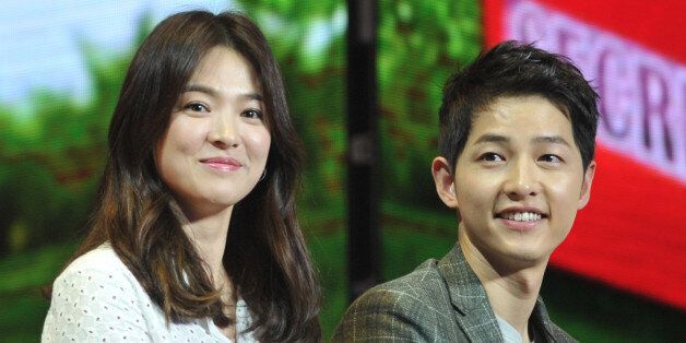 CHENGDU, CHINA - JUNE 17:  (CHINA OUT) South Korea actress Song Hye Kyo and actor Song Joong-ki attend fan meeting on June 17, 2016 in Chengdu, Sichuan Province of China.  (Photo by VCG/VCG via Getty Images)