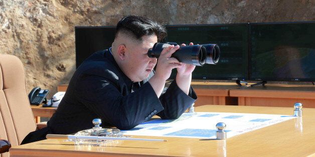 North Korean Leader Kim Jong Un looks on during the test-fire of inter-continental ballistic missile Hwasong-14 in this undated photo released by North Korea's Korean Central News Agency (KCNA) in Pyongyang, July, 4 2017. KCNA/via REUTERS ATTENTION EDITORS - THIS IMAGE WAS PROVIDED BY A THIRD PARTY. REUTERS IS UNABLE TO INDEPENDENTLY VERIFY THIS IMAGE. NO THIRD PARTY SALES. SOUTH KOREA OUT.