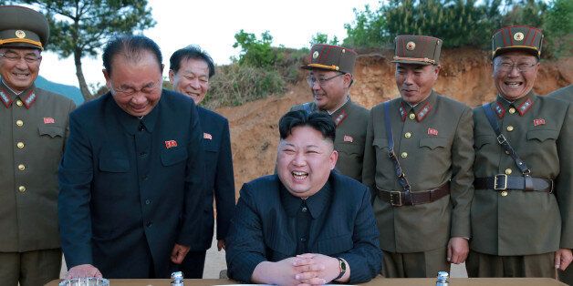FILE PHOTO - North Korean leader Kim Jong Un reacts during the long-range strategic ballistic rocket Hwasong-12 (Mars-12) test launch in this undated photo released by North Korea's Korean Central News Agency (KCNA) on May 15, 2017. KCNA via REUTERS/File Photo   REUTERS ATTENTION EDITORS - THIS IMAGE WAS PROVIDED BY A THIRD PARTY. REUTERS IS UNABLE TO INDEPENDENTLY VERIFY THIS IMAGE. NO THIRD PARTY SALES. SOUTH KOREA OUT.
