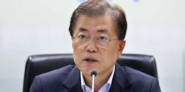 SEOUL, SOUTH KOREA - JULY 04:  In this handout photo released by the South Korean Presidential Blue House, South Korean President Moon Jae-in speaks as he presides over a meeting of the National Security Council at the presidential Blue House on July 4, 2017 in Seoul, South Korea. North Korea fired an unidentified ballistic missile on Tuesday from a location near the North's border with China into waters at Japan's exclusive economic zone, east of the Korean Peninsula, according to reports. The