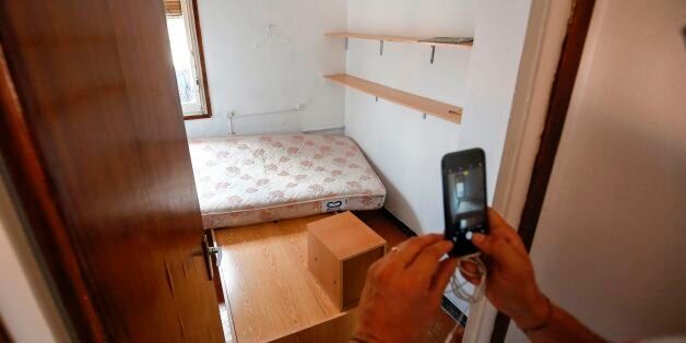 A picture taken on August 19, 2017 with the agreement of the flatmate of imam Abdelbaki Es Satty shows the room of the imam, after police officers carried out a search linked to the deadly terror Barcelona attack at the home in Ripoll, two days after a van ploughed into the crowd, killing 13 persons and injuring over 100.The El Pais daily, quoting police sources, said the imam could be one of the dead in the explosion of Alcanar. Drivers have ploughed on August 17, 2017 into pedestrians in two q