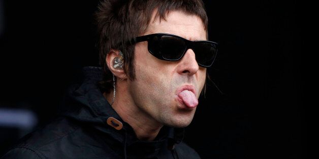 Liam Gallagher performs with his band Beady Eye during the Glastonbury music festival at Worthy Farm in Somerset, June 28, 2013. REUTERS/Olivia Harris (BRITAIN - Tags: ENTERTAINMENT)