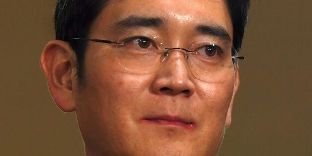 Lee Jae-Yong, vice chairman of Samsung Electronics, arrives for questioning at the office of a special prosecutor investigating a corruption scandal in Seoul on February 22, 2017.Lee was arrested last week over his alleged involvement in a massive corruption scandal that has led to President Park Geun-Hye's impeachment. / AFP / JUNG Yeon-Je        (Photo credit should read JUNG YEON-JE/AFP/Getty Images)