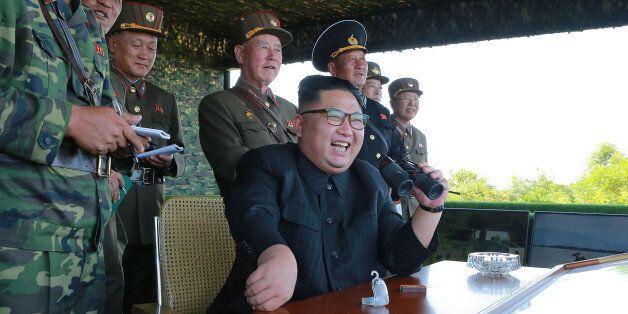 This undated photo released by North Korea's official Korean Central News Agency (KCNA) on August 26, 2017 shows North Korean leader Kim Jong-Un (C) presiding over a target strike exercise conducted by the special operation forces of the Korean People's Army (KPA) at an undisclosed location.North Korea fired three short-range ballistic missiles on August 26, the US military said, following weeks of heightened tensions between Washington and Pyongyang. / AFP PHOTO / KCNA via KNS / STR / South Kor