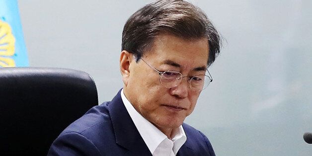 SEOUL, SOUTH KOREA - JULY 29:  In this handout photo released by the South Korean Presidential Blue House, South Korean President Moon Jae-in speaks as he presides over a meeting of the National Security Council at the presidential Blue House on July 29, 2017 in Seoul, South Korea. North Korea launched another test missile, believed to be an Inter Continental Ballistic Missile (ICBM), which travelled 45 minutes before splashing down in the Exclusive Economic Zone (EEZ) of Japan.  (Photo by South