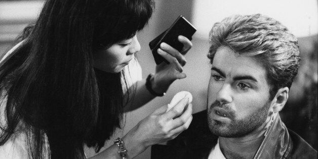 English singer and songwriter George Michael (1963-2016) pictured receiving attention from a make up artist prior to appearing at a press conference during the Japanese/Australasian leg of his Faith World Tour, February-March 1988. (Photo by Michael Putland/Getty Images)