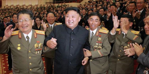 This undated picture released by North Korea's official Korean Central News Agency (KCNA) on September 10, 2017 shows North Korean leader Kim Jong-Un (front 2nd L) attending an art performance dedicated to nuclear scientists and technicians, who worked on a hydrogen bomb which the regime claimed to have successfully tested, at the People's Theatre in Pyongyang. / AFP PHOTO / KCNA VIA KNS / STR / South Korea OUT / REPUBLIC OF KOREA OUT   ---EDITORS NOTE--- RESTRICTED TO EDITORIAL USE - MANDATORY