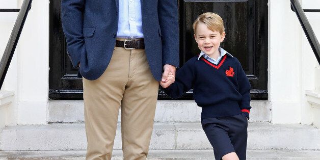 LONDON, ENGLAND - SEPTEMBER 07: (In this handout photo released by the Duke and Duchess of Cambridge) Prince William, the Duke of Cambridge with his son Prince George on his first day of school on September 7, 2017 in London, England. The picture was taken at Kensington Palace in London shortly before Prince George left for his first day of school at Thomas's Battersea. Photographer Chris Jackson who took the picture said âThe first day of school is an exciting time for any child, and it wa