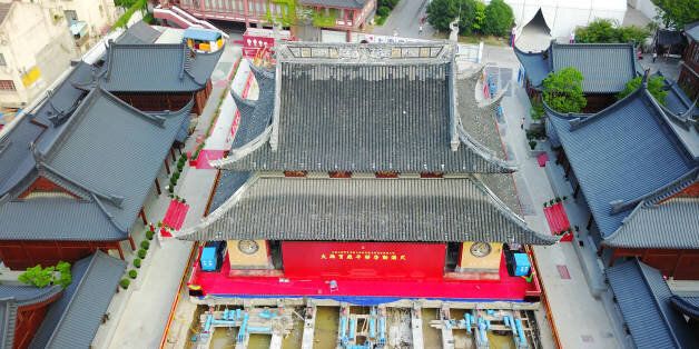 SHANGHAI, CHINA - SEPTEMBER 06:  Aerial view of the main hall of Jade Buddha Temple (aka Yufo Temple) moved horizontally on September 6, 2017 in Shanghai, China. The main hall of Shanghai's Jade Buddha Temple will be entirely moved over 30 meters horizontally and more than 1 meter higher in order to enlarge the space between the halls and ensure the safety of wooden buildings.  (Photo by VCG/VCG via Getty Images)
