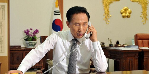 SEOUL, SOUTH KOREA - MAY 26:  South Korean President Lee Myung-Bak talks with US President Barack Obama on the phone at the presidential Blue House on May 26, 2009 in Seoul, South Korea. North Korea fired two short-range missiles from its east coast on Tuesday. North Korea has announced that it successfully conducted a second nuclear test, raising the stakes in the international effort to get the nation to give up its nuclear weapons program.  (Photo by Presidential House via Getty Images)