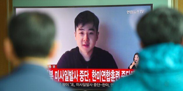South Koreans watch a television news showing a video footage of a man who claims he is Kim Han-Sol, a nephew of North Korea's leader Kim Jong-Un, at a railway station in Seoul on March 8, 2017.The video of a man describing himself as the son of assassinated North Korean exile Kim Jong-Nam emerged on March 8, apparently the first time a family member has spoken about the killing. / AFP PHOTO / JUNG Yeon-Je        (Photo credit should read JUNG YEON-JE/AFP/Getty Images)