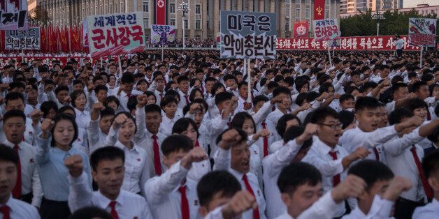 Students march during a mass rally on Kim Il-Sung sqaure in Pyongyang on September 23, 2017.Tens of thousands of Pyongyang residents were gathered in the capital's Kim Il-Sung sqaure to laud leader Kim Jong-Un's denounciation of US President Donald Trump. / AFP PHOTO / KIM WON-JIN        (Photo credit should read KIM WON-JIN/AFP/Getty Images)