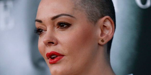 Actress Rose McGowan poses at the premiere for the television movie