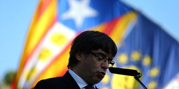 Catalan President Carles Puigdemont delivers a speech at the memorial of