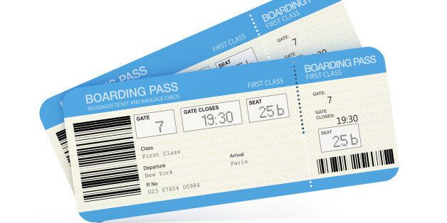Two airline boarding pass tickets isolated on white