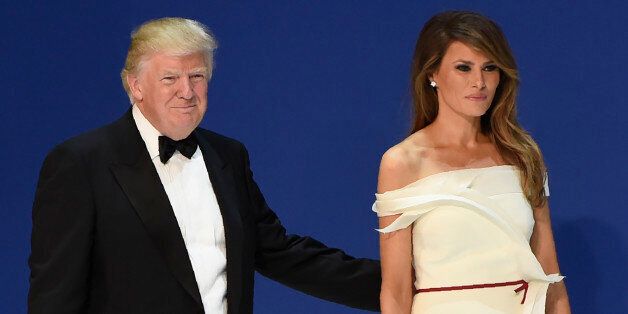 US President Donald Trump and First Lady Melania Trump during the Salute to Our Armed Services Inaugural Ball at the National Building Museum in Washington, DC, January 20, 2017. / AFP / SAUL LOEB        (Photo credit should read SAUL LOEB/AFP/Getty Images)