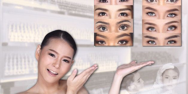 Young White Asian woman show empty copy space on the hand palm with clinic background, Concept Beauty Medical service permanent tattooing on eyebrow many style