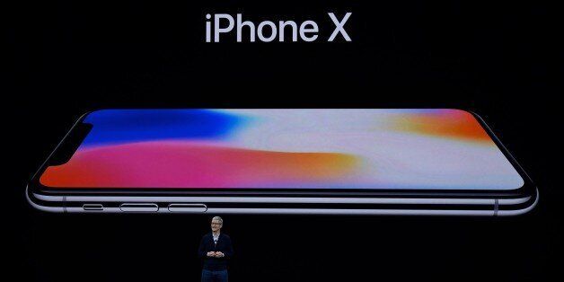 CUPERTINO, CA - SEPTEMBER 12: Apple CEO Tim Cook introduces iPhone X during the Apple launch event on September 12, 2017 in Cupertino,California. Apple Inc. unveiled its new iPhone 8, iPhone X, iPhone 8 Plus, and the Apple Watch Series 3 at the new Apple Park campus. (Photo by Qi Heng/VCG via Getty Images)