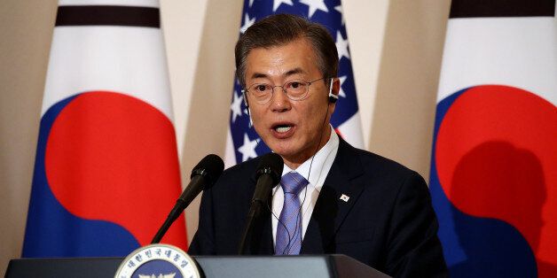 Moon Jae-in, South Korea's president, speaks during a news conference with U.S. President Donald Trump, not pictured, at the presidential Blue House in Seoul, South Korea, on Tuesday, Nov. 7, 2017. Trump said that North Korea should come to the table and make a deal on its missile and nuclear programs. Photographer: SeongJoon Cho/Bloomberg via Getty Images