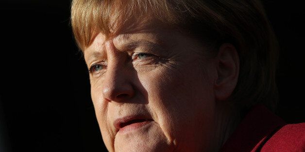 BERLIN, GERMANY - NOVEMBER 17:  A German Chancellor and leader of the German Christian Democrats (CDU) Angela Merkel speaks to the media as she arrives for further talks the morning after leaders of the four negotiating parties failed to reach consensus over issues in their preliminary coaliton talks on November 17, 2017 in Berlin, Germany. The German Christian Democrats (CDU), its sister party the Bavarian Christian Democrats (CSU), the Free Democratic Party (FDP) and the Greens Party (Buendnis