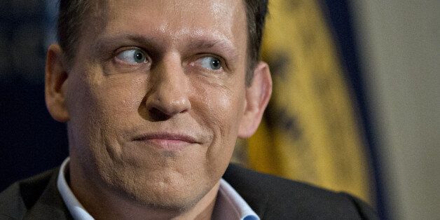 Peter Thiel, co-founder of PayPal Inc., pauses while listening to a question during a news conference at the National Press Club in Washington, D.C., U.S., on Monday, Oct. 31, 2016. Thiel, the Silicon Valley entrepreneur and Donald Trump supporter, endorsed him at the Republican National Convention and is planning to donate $1.25 million to Trump's campaign. Photographer: Andrew Harrer/Bloomberg via Getty Images