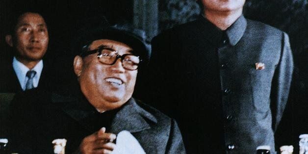 NORTH KOREA:File photo released by the Korea News Service dated October 1980 shows North Korean leader Kim Jong-Il (R) and father Kim Il-Sung (front), attending an evening party to celebrate the 6th Korean Worker's Party convention.  Kim Jong-Il was re-elected as head of the country's powerful National Defense Commission, Pyongyang Radio said 05 September, as CNN reported the title of president had been abolished in defense to Kim Il-Sung's father who died in 1994, leaving Kim Il-Sung as effecti