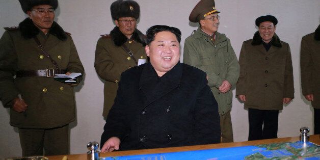 North Korea's leader Kim Jong Un is seen as the newly developed intercontinental ballistic rocket Hwasong-15's test was successfully launched, in this undated photo released by North Korea's Korean Central News Agency (KCNA) in Pyongyang November 30, 2017. REUTERS/KCNA ATTENTION EDITORS - THIS IMAGE WAS PROVIDED BY A THIRD PARTY. REUTERS IS UNABLE TO INDEPENDENTLY VERIFY THIS IMAGE. SOUTH KOREA OUT. NO THIRD PARTY SALES. NOT FOR USE BY REUTERS THIRD PARTY DISTRIBUTORS