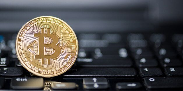 ChonBuri ,thailand - jul 17,2017: Golden Bitcoin money on computer.