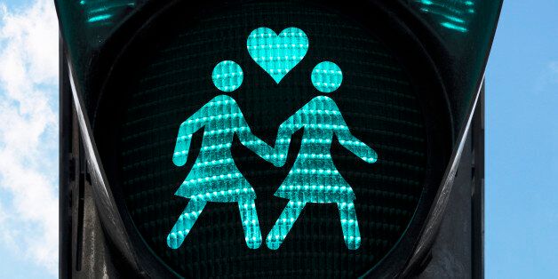 traffic light with gay theme - two women holding hands.