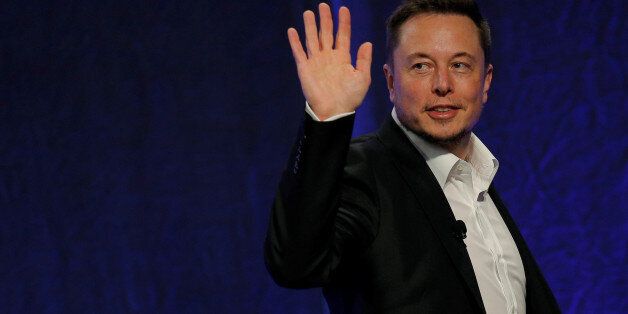 Tesla Motors CEO Elon Musk waves as he leaves the stage after speaking at the National Governors Association Summer Meeting in Providence, Rhode Island, U.S., July 15, 2017. REUTERS/Brian Snyder
