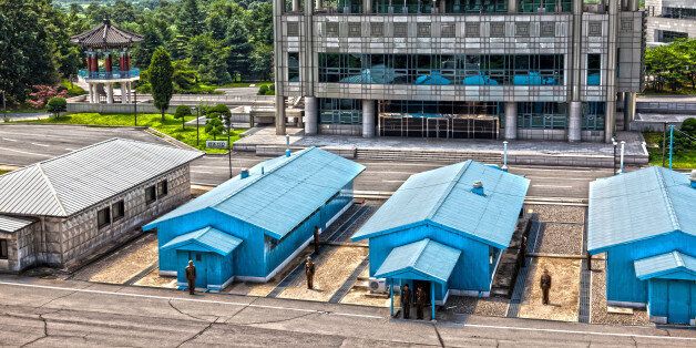 A view of the JSA in HDR.Only the concrete line in between the blue huts separate South and North Korea.