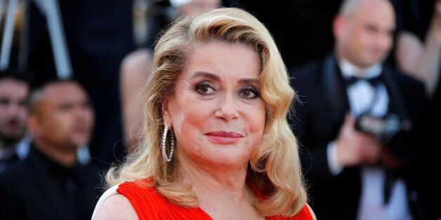 70th Cannes Film Festival - Event for the 70th Anniversary of the festival - Red Carpet Arrivals - Cannes, France. 23/05/2017. Actress Catherine Deneuve poses. REUTERS/Jean-Paul Pelissier