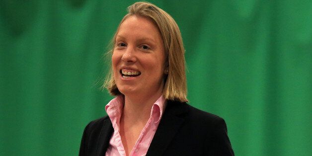 NORWICH, ENGLAND - MAY 28:  Sports Minister Tracey Crouch MP plays table tennis during her visit to the Sport England 'Fit for Fun' project at the University of East Anglia on May 28, 2015 in Norwich, England. (Photo by Stephen Pond/Getty Images for Sport England)
