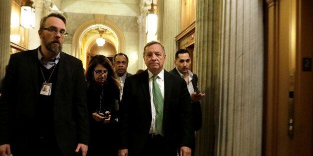 Senator Dick Durbin (D-IL) (C) arrives at Democratic Party caucus meeting on Capitol Hill in Washington, U.S., January 19, 2018. REUTERS/Yuri Gripas
