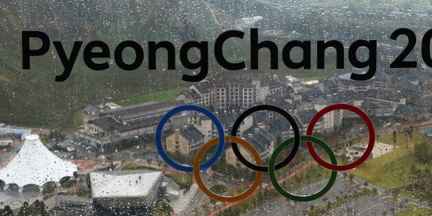 The PyeongChang 2018 Winter Olympic Games logo is seen at the the Alpensia Ski Jumping Centre in Pyeongchang, South Korea, September 27, 2017.  REUTERS/Pawel Kopczynski