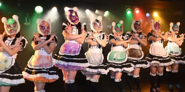 Female idol group Kasotsuka Shojo (Virtual Currency Girls), produced by Japanese idol agency Cinderella Academy, pose on stage in Tokyo on January 12, 2018.Japan's ever-growing number of pop 'idol' groups has a new addition as Virtual Currency Girls make their debut with a promise to help public education on burgeoning crypto-coins. / AFP PHOTO / Kazuhiro NOGI        (Photo credit should read KAZUHIRO NOGI/AFP/Getty Images)