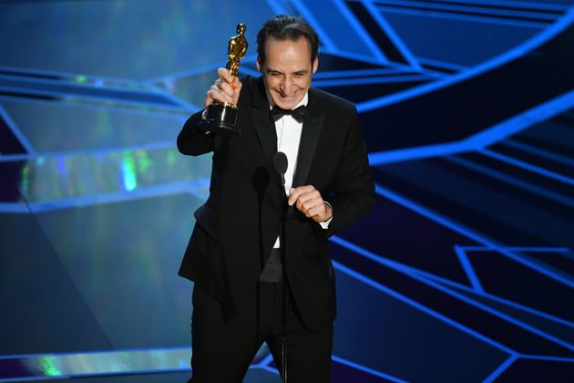 Composer Alexandre Desplat accepts Best Original Score for 'The Shape of Water' onstage during the 90th Annual Academy Awards